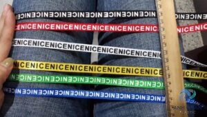 DÂY VẢI IN CHỮ DÙNG LÀM QUAI DÉP , TÚI XÁCH VV...........VV. MAY MẶC